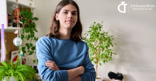 teenager crossed arms looking at camera